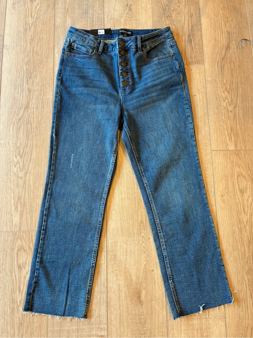 NWT Kenneth Cole High-Rise Button-Fly stretch medium Wash jeans 10 raw hem